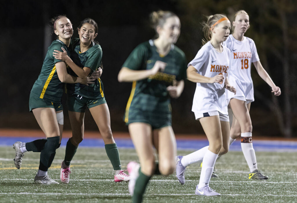 Shorecrest&rsquo;s Olivia Taylor hugs Shorecrest&rsquo;s Nemesia Peters after scoring a goal against Monroe during the 3A girls district game on Nov. 4, 2025 in Shoreline. (Olivia Vanni / The Herald)

