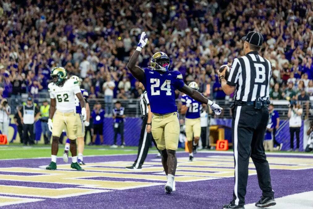 Washington Huskies running back Adam Mohammed celebrates after a touchdown against Colorado State on Aug. 30 at Husky Stadium in Seattle. (Scott Eklund / Red Box Pictures / Washington Athletics)