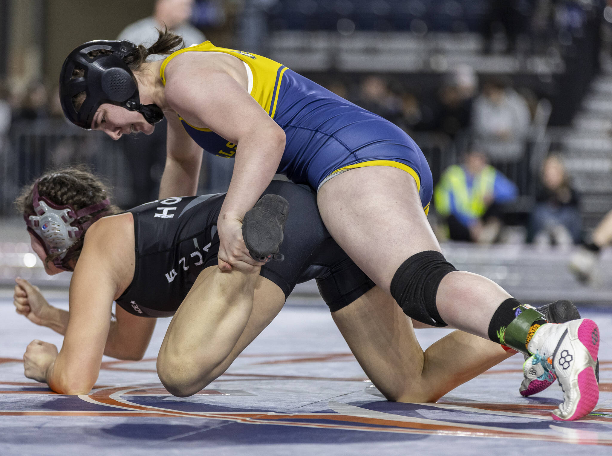 Everetts Mia Cienga gets control of her opponents foot during the 190-pound 3A girls championship match at the Mat Classic on Friday, Feb. 21, 2025 in Tacoma, Washington. (Olivia Vanni / The Herald)