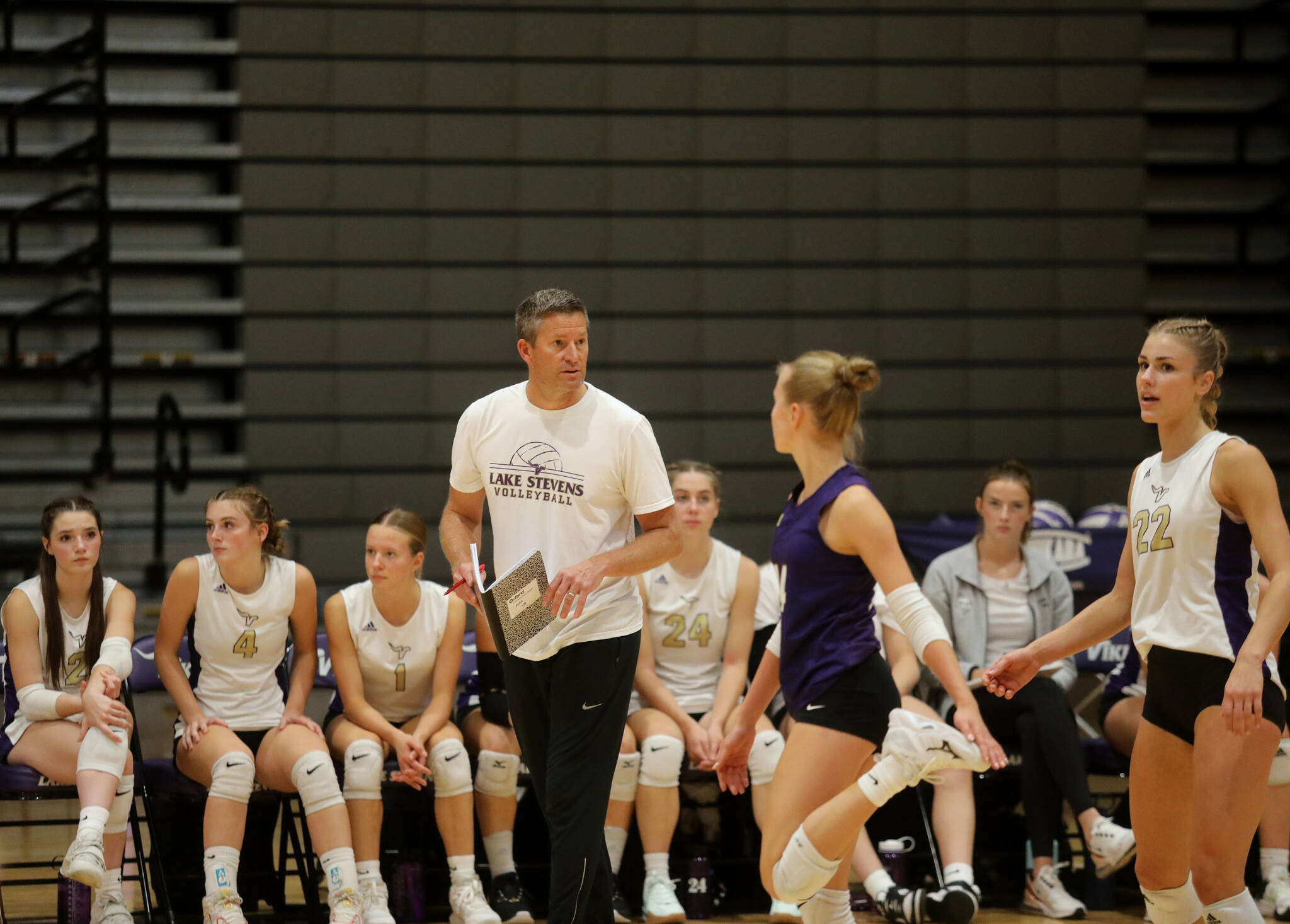 Lake Stevens volleyball coach Kyle Hoglund talks to his team in the season opener against Curtis High School in Lake Stevens, Wash., on Sept. 11, 2024. Curtis won all three sets: 25-19, 25-20 and 25-18. (Taras McCurdie / The Herald)