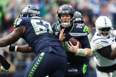 Seahawks quarterback Sam Darnolds turnovers have been an issue for Seattle this season. (Getty Images / The Athletic)