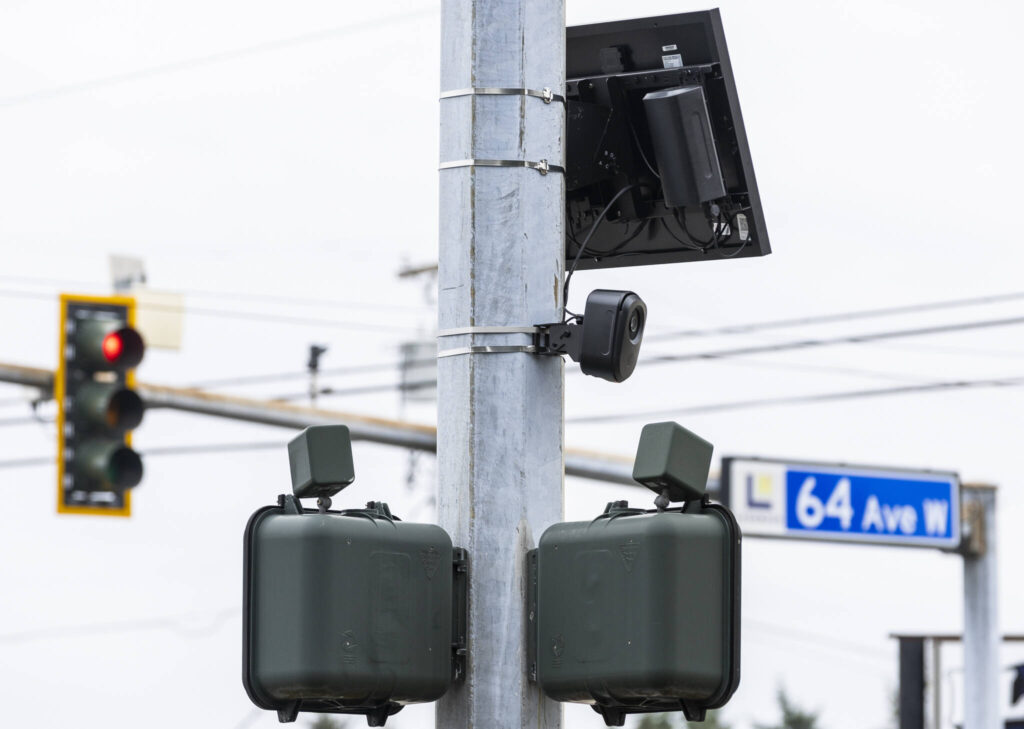 A Flock Safety camera on the corner of 64th Avenue West and 196th Street Southwest on Oct. 28, 2025 in Lynnwood, Washington. (Olivia Vanni / The Herald)
