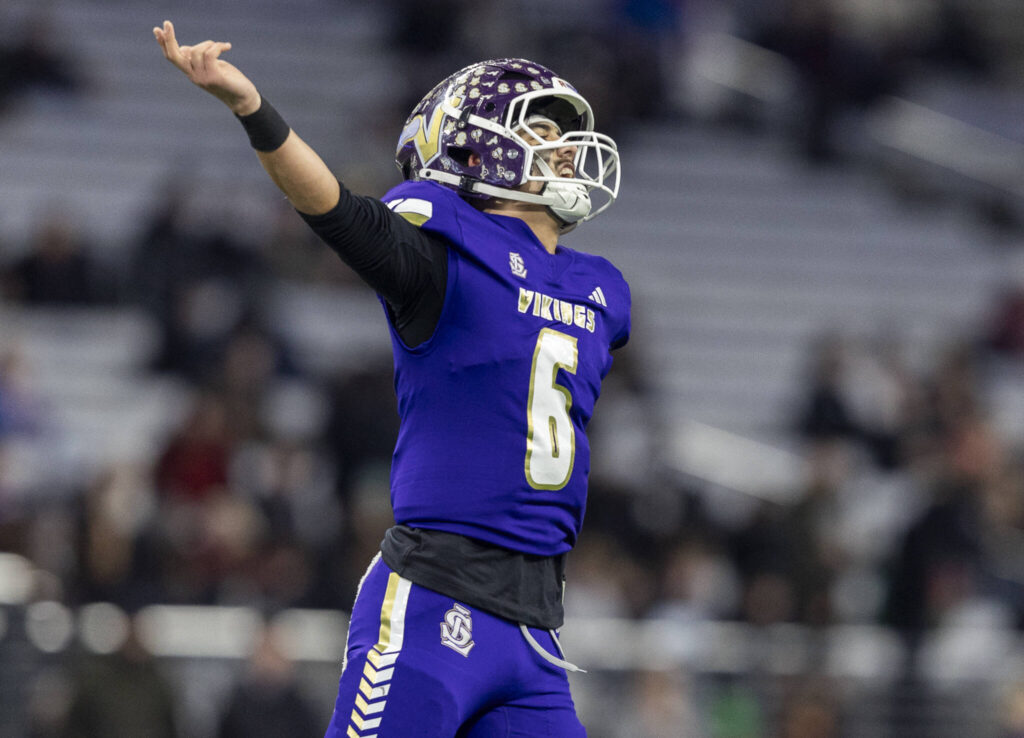 Lake Stevens’ Blake Moser yells after a touchdown during the 4A state championship game against Sumner at Husky Stadium on Saturday, Dec. 6, 2025 in Seattle, Washington. (Olivia Vanni / The Herald)
