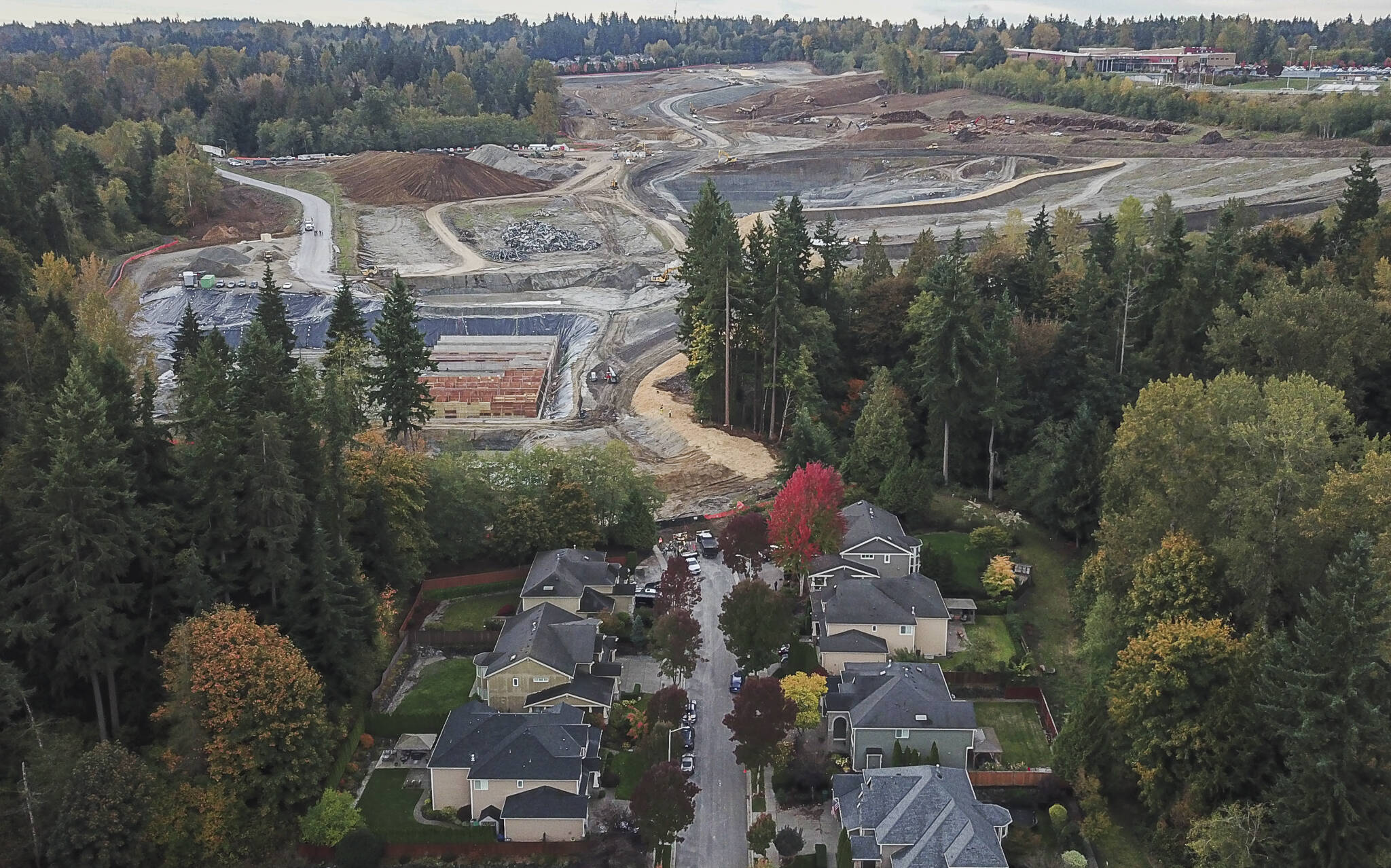 A view of the Eastview development looking south along 79th Avenue where mud and water runoff flowed due to rain on Oct. 16, 2025 in Snohomish, Washington. (Olivia Vanni / The Herald)