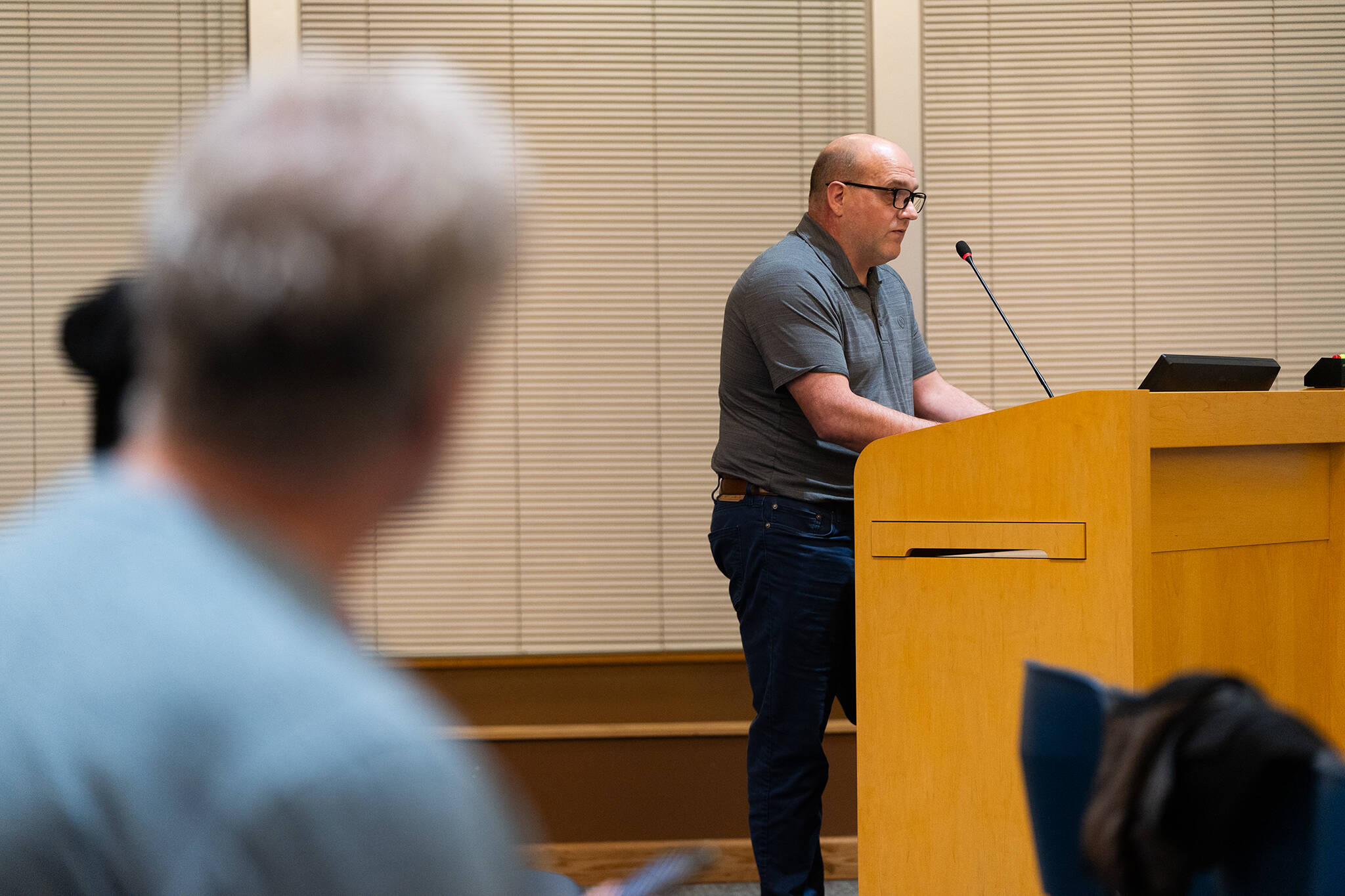 Bob Danson, the general manager of the Olympic View Water and Sewer District, speaks to the Edmonds City Council in favor of an updated critical areas ordinance on Tuesday, Jan. 6 in Edmonds, Washington. (Will Geschke / The Herald)