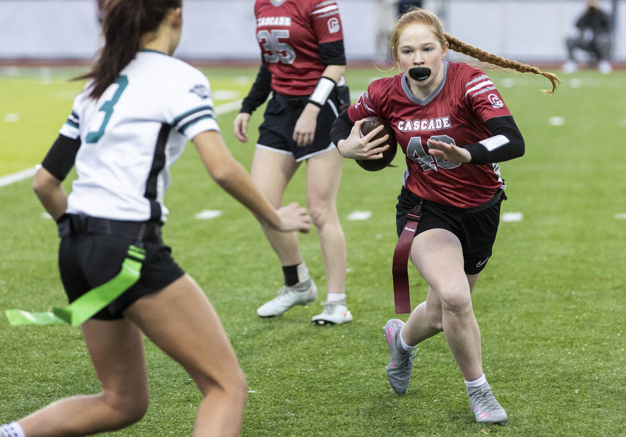 Cascades Caylee Krestel runs the ball against Jackson during the game on Wednesday, Jan. 14, 2026 in Everett, Washington. (Olivia Vanni / The Herald)
