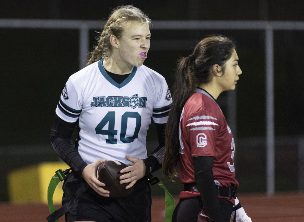 Jackson&rsquo;s Clara Dorgan reacts after scoring a touchdown against Cascade during the game on Wednesday, Jan. 14, 2026 in Everett, Washington. (Olivia Vanni / The Herald)
