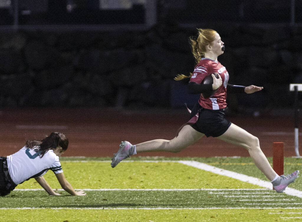 Cascade&rsquo;s Caylee Krestel runs the ball into the end zone for a touchdown against Jackson during the game on Wednesday, Jan. 14, 2026 in Everett, Washington. (Olivia Vanni / The Herald)

