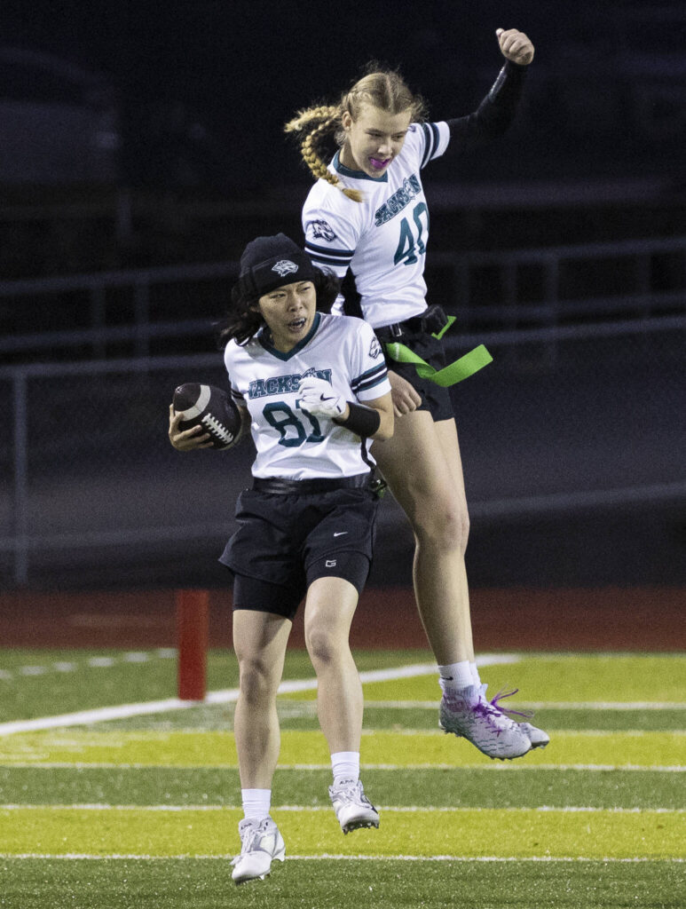 Jackson&rsquo;s Erica Yong celebrates scoring a touchdown against Cascade during the game on Wednesday, Jan. 14, 2026 in Everett, Washington. (Olivia Vanni / The Herald)
