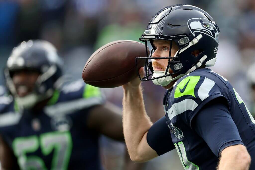 Seahawks quarterback Sam Darnold was listed as questionable to play against the 49ers for Saturday's playoff game. (Getty Images / The Athletic)