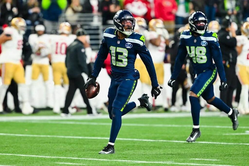 Seattle Seahawks linebacker Ernest Jones IV (13) jogs toward an end zone to celebrate after intercepting a pass against the San Francisco 49ers on Saturday, Jan. 17, 2026 at Lumen Field in Seattle, Washington. (Photo courtesy of the Seattle Seahawks)

