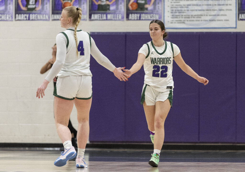 Edmonds-Woodway&rsquo;s Amara Leckie high fives Edmonds-Woodway&rsquo;s Finley Wichers during the game against Archbishop Murphy on Tuesday, Jan. 20, 2026 in Edmonds, Washington. (Olivia Vanni / The Herald)

