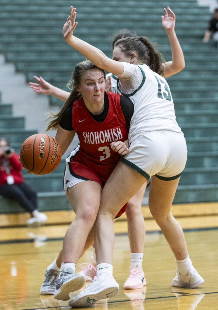 Snohomish&rsquo;s Kendall Hammer dribbles while being guarded by Jackson&rsquo;s Hayden Andrina during the game on Thursday, Jan. 22, 2026 in Mill Creek, Washington. (Olivia Vanni / The Herald)
