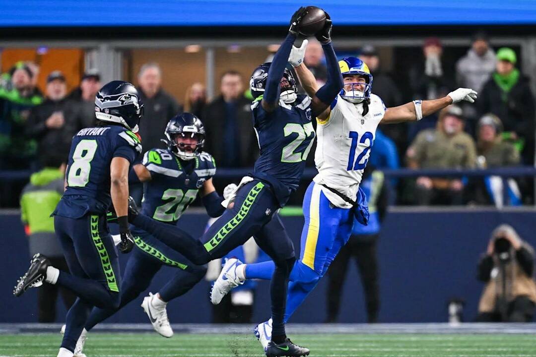 Seattle Seahawks cornerback Riq Woolen (27) breaks up a pass intended for Los Angeles Rams receiver Puka Nacua (12) during the NFC Championship game at Lumen Field in Seattle, Washington on Sunday, Jan. 25, 2026. (Photo courtesy of the Seattle Seahawks)