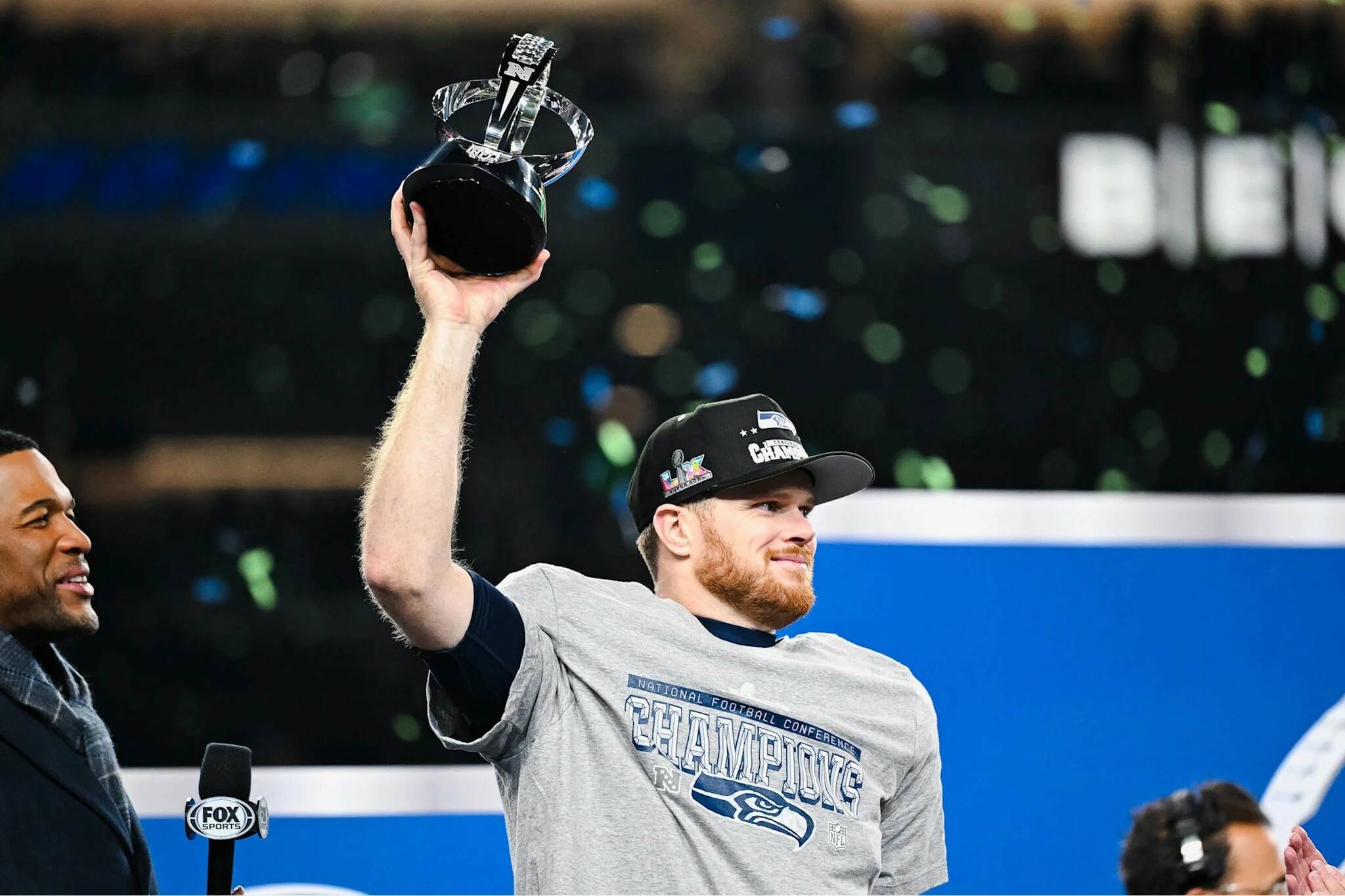 Seahawks quarterback Sam Darnold holds the George Halas NFC Championship trophy after Seattle defeated the Los Angeles Rams at Lumen Field in Seattle, Washington on Sunday, Jan. 25, 2026. (Photo courtesy of the Seattle Seahawks)