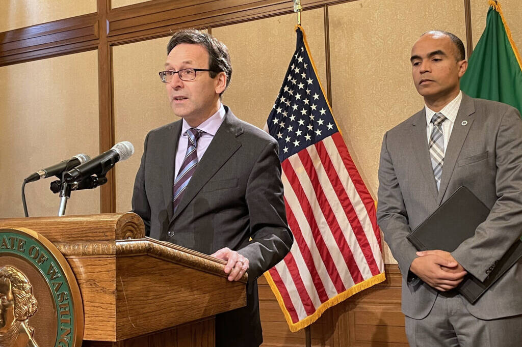 Washington Gov. Bob Ferguson discusses preparations on Monday, Jan. 26, 2026, that he and state Attorney General Nick Brown, right, are preparing if federal law enforcement agents conduct immigration activities similar to whats occurred in Minnesota. Both are Democrats. (Jerry Cornfield/Washington State Standard)