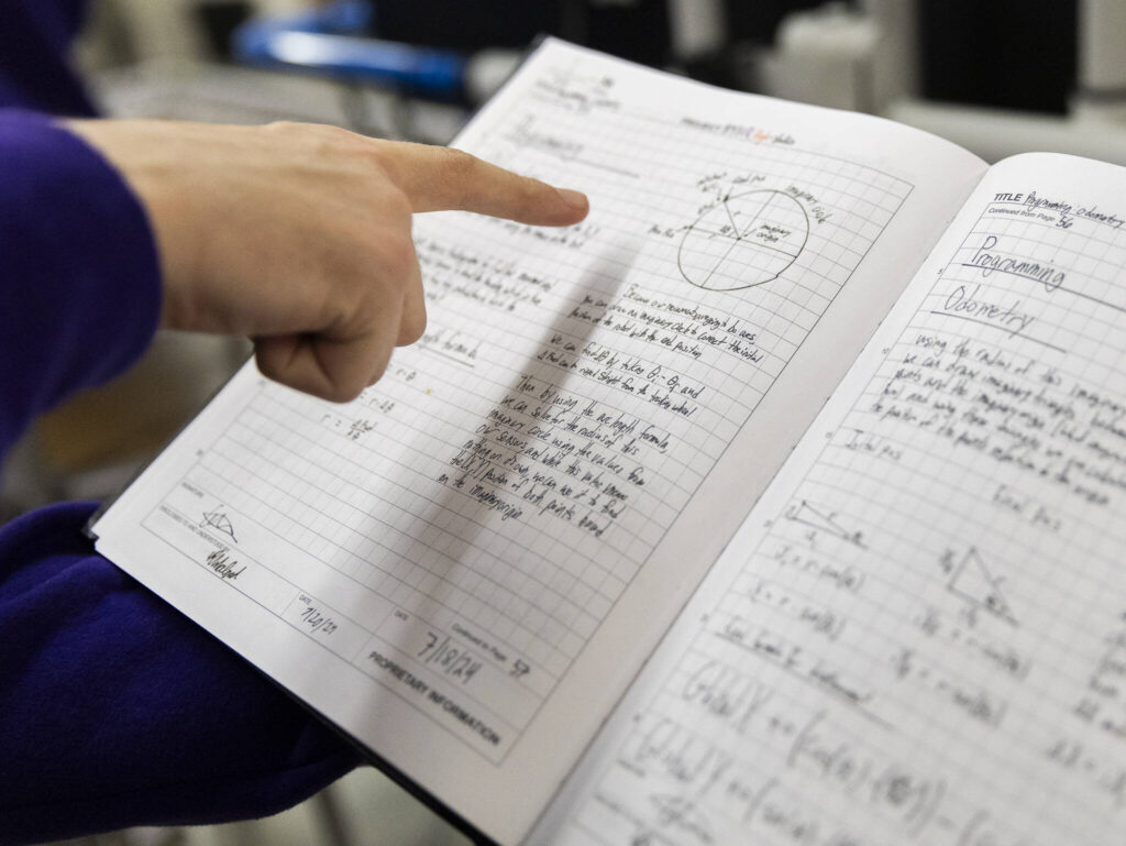 Colwyn Roberts talks about some the team&rsquo;s early odometry calculations for their robot on Thursday, Jan. 29, 2026 in Lake Stevens, Washington. (Olivia Vanni / The Herald)
