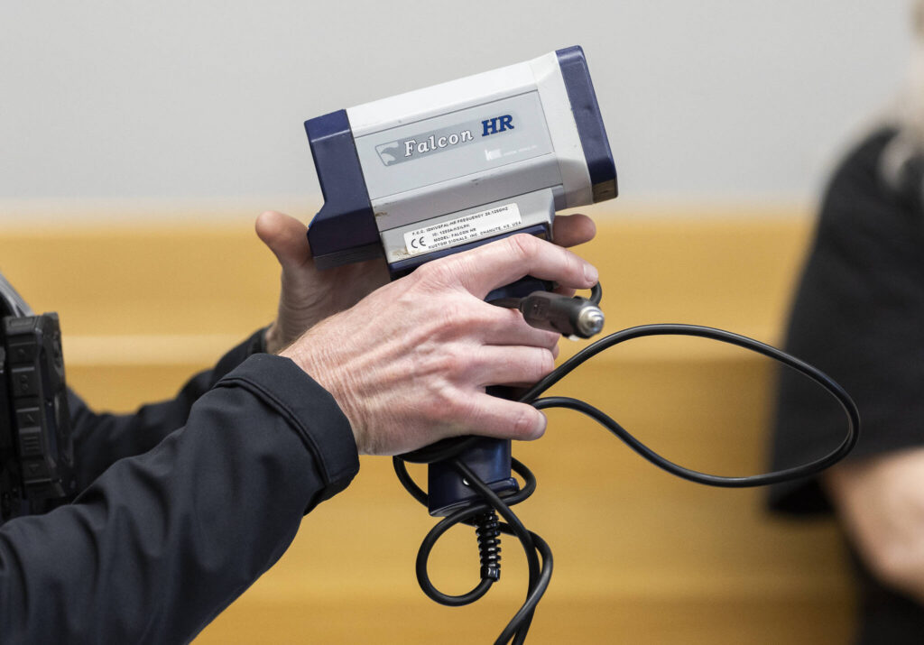 Lake Stevens police officer David Carter shows and example of a speed radar during the Youth Traffic Court session at the Snohomish County Courthouse on Friday, Jan. 30, 2026 in Everett, Washington. (Olivia Vanni / The Herald)
