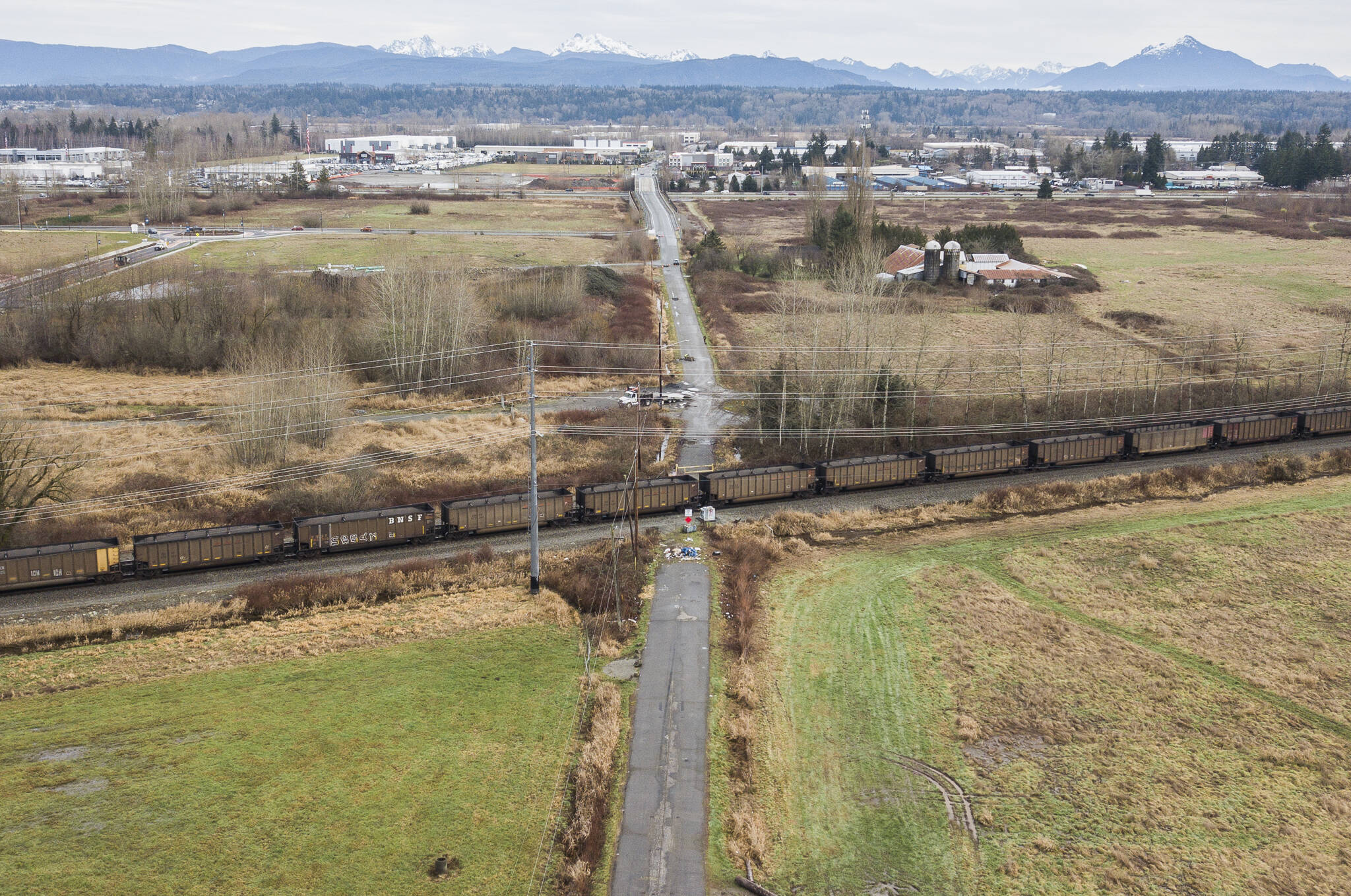 A train sits on the tracks that intersects with 156th Street Northeast on Tuesday, Feb. 3, 2026 in Marysville, Washington. (Olivia Vanni / The Herald)