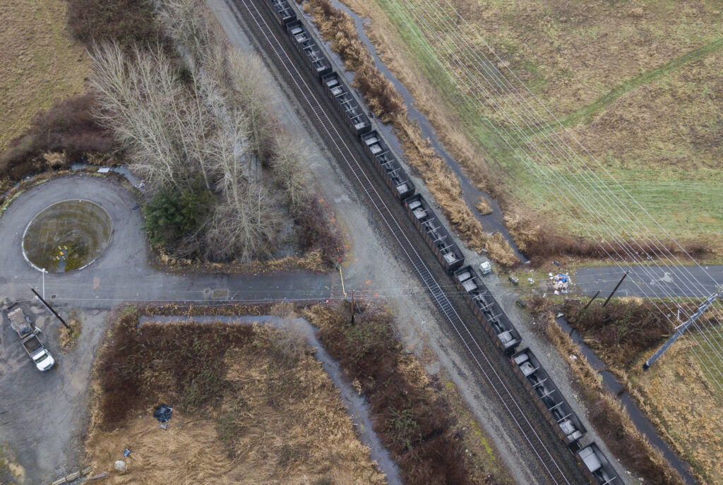 A train sits on the tracks that intersects with 156th Street Northeast on Tuesday, Feb. 3, 2026 in Marysville, Washington. (Olivia Vanni / The Herald)
