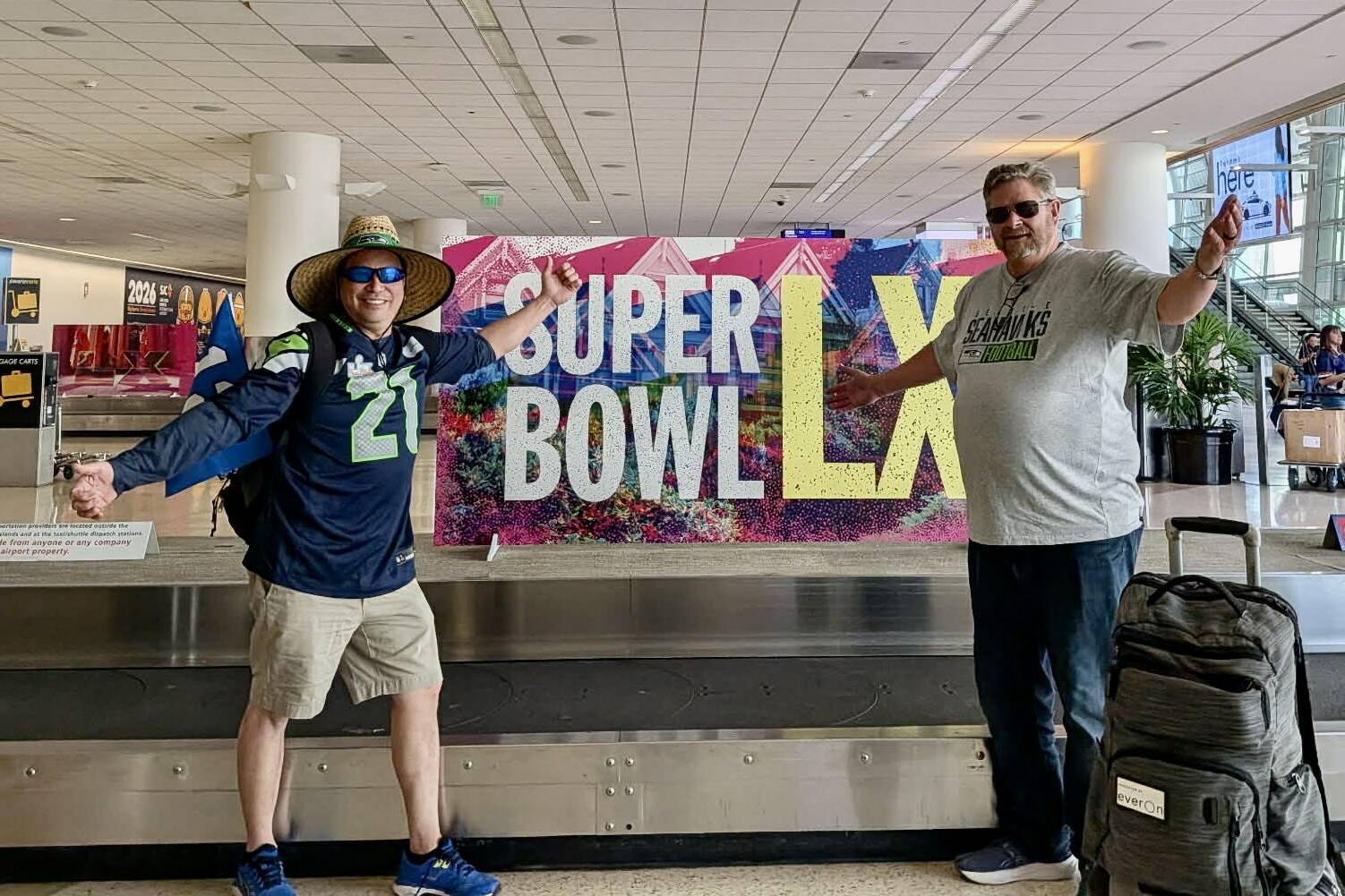 Seahawks fans Daniel Abad (left) and Donald Kracht arrive at San Jose International Airport on their way to Sundays Super Bowl. (Photo courtesy of Daniel Abad)
