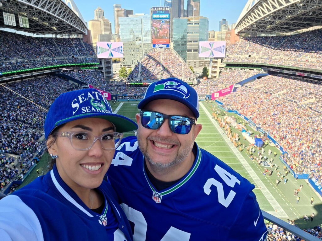 Seth and Tabitha Nilson (left) of Stanwood attend a Seahawks game at Lumen Field in Seattle, Washington. (Photo courtesy of Seth Nilson)
