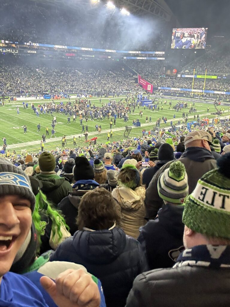 Trae Tinglestad (left) celebrates the Seahawks win over the Los Angeles Rams at Lumen Field in Seattle, Washington on Sunday, Jan. 25, 2026. (Photo courtesy of Trae Tinglestad)
