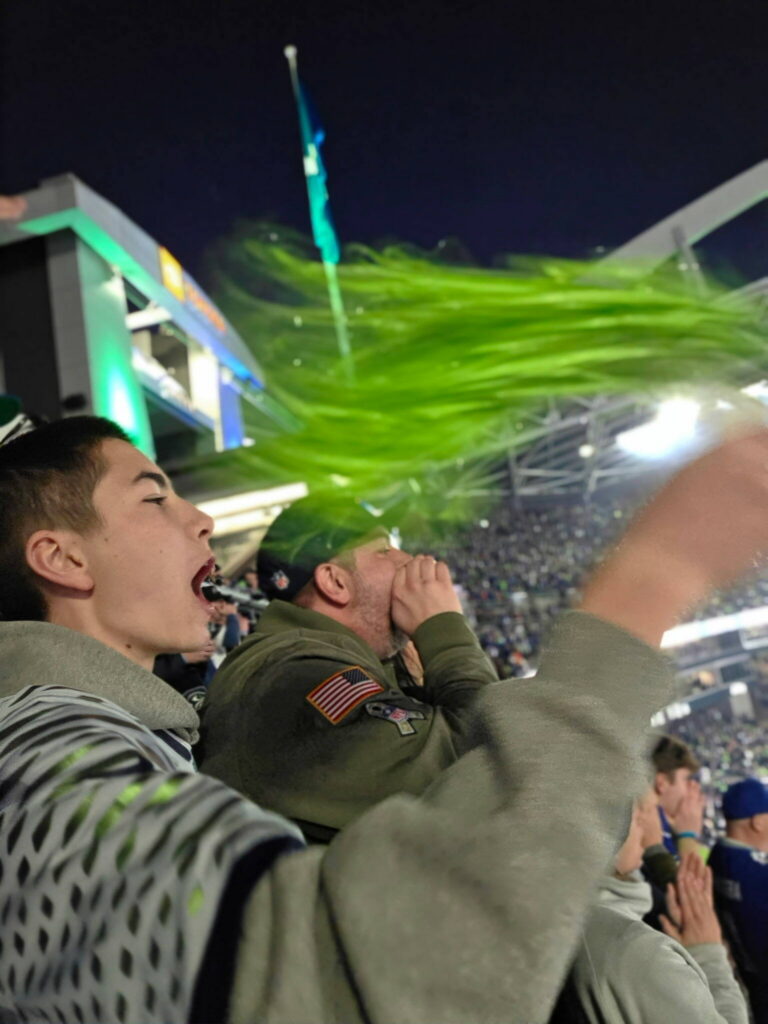 Seth Nilson and his son Justus cheer on the Seahawks during a 2025 game at Lumen Field in Seattle, Washington (Photo courtesy of Seth Nilson)
