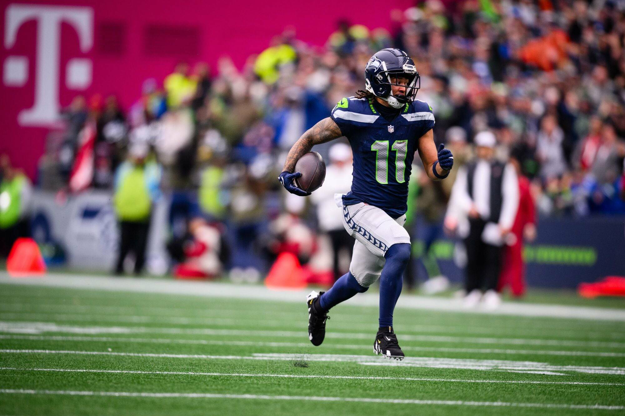 Seattles Jaxon Smith-Njigba (11) runs after a catch during the first half as the Seahawks take on the Arizona Cardinals in an NFL game on Sunday, Nov. 24, 2024, at Lumen Field in Seattle. The Seahawks won 16-6. (Naji Saker/TNS)