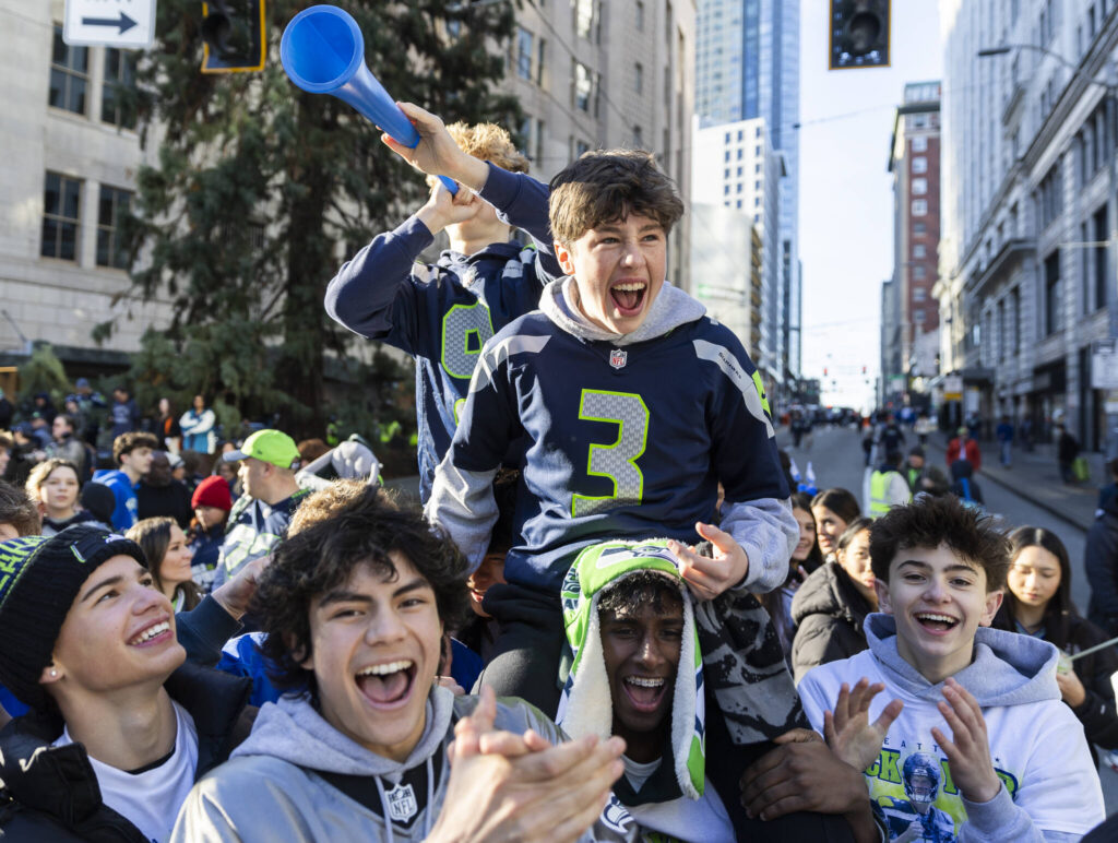 Hayden Ritchie cheers before the start of the Seahawks World Champions Parade on Wednesday, Feb. 11, 2026, in Seattle, Washington. (Olivia Vanni / The Herald)
