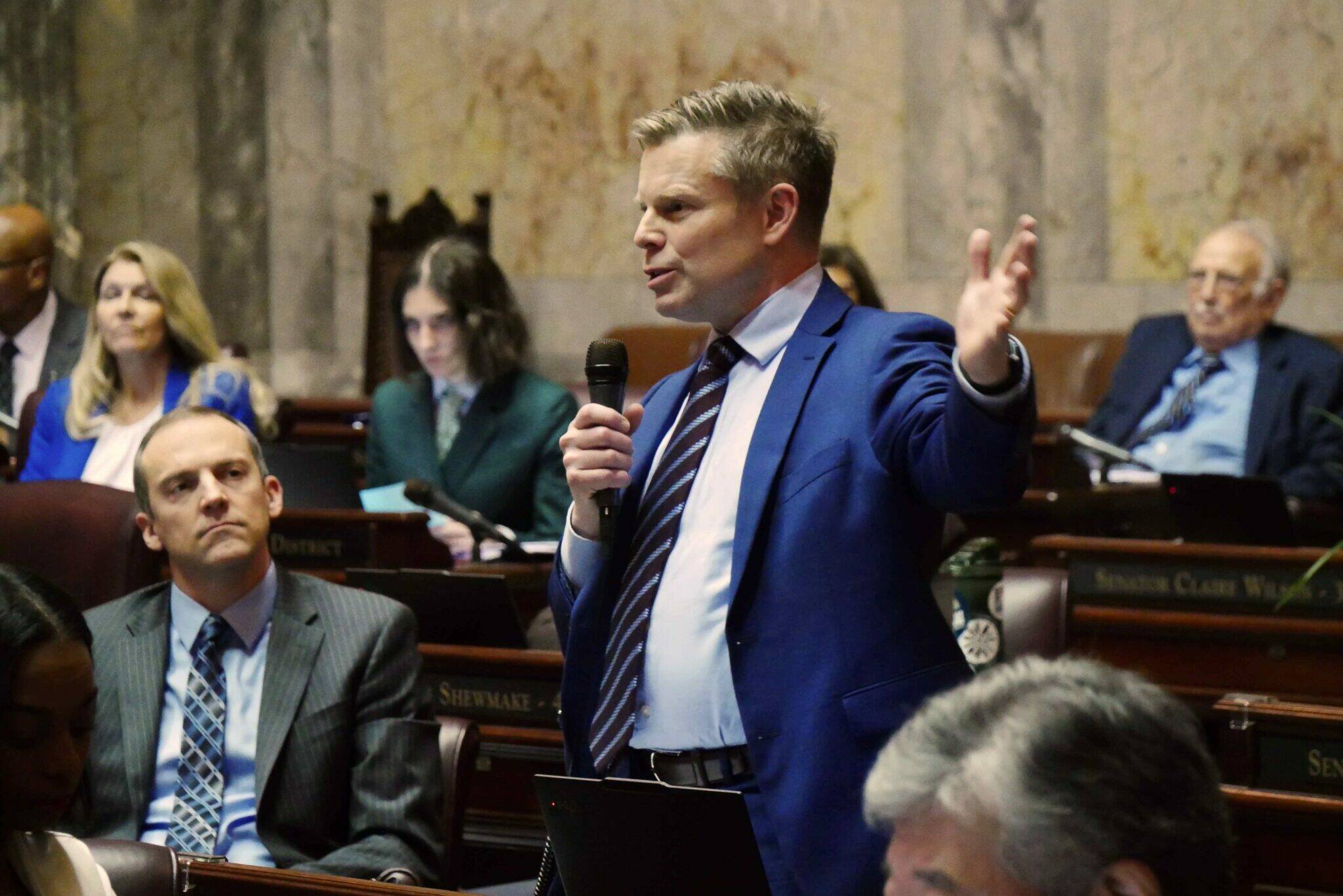 Senate Majority Leader Jamie Pedersen, D-Seattle, makes remarks on Monday during the floor debate over legislation he sponsored to tax personal income over $1 million a year. (Photo by Bill Lucia/Washington State Standard)
