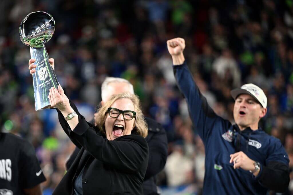 Seattle Seahawks chair Jody Allen lifts the Lombardi Trophy after the team defeated the New England Patriots 29-13 in Super Bowl LX on Sunday, Feb. 8, 2026 at Levis Stadium in Santa Clara, Calif. (Josh Adelson / AFP / Getty Images / The Athletic)