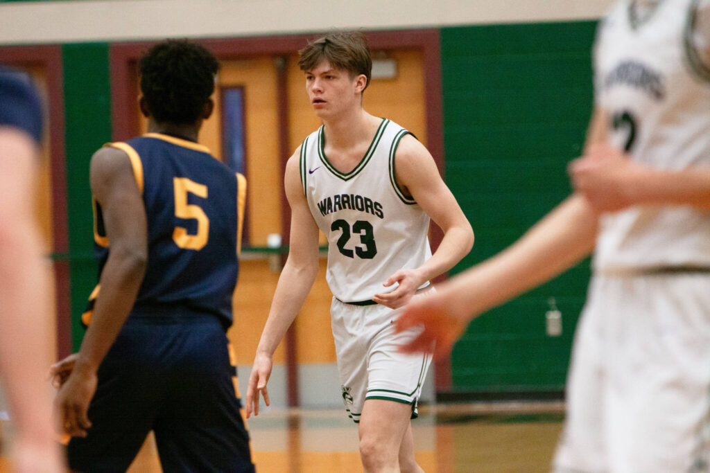 Edmonds-Woodway&rsquo;s DJ Karl brings the ball up the floor against Everett during a district basketball game on Saturday, Feb. 21, 2026 at Jackson H.S. in Mill Creek. (Qasim Ali / The Herald)
