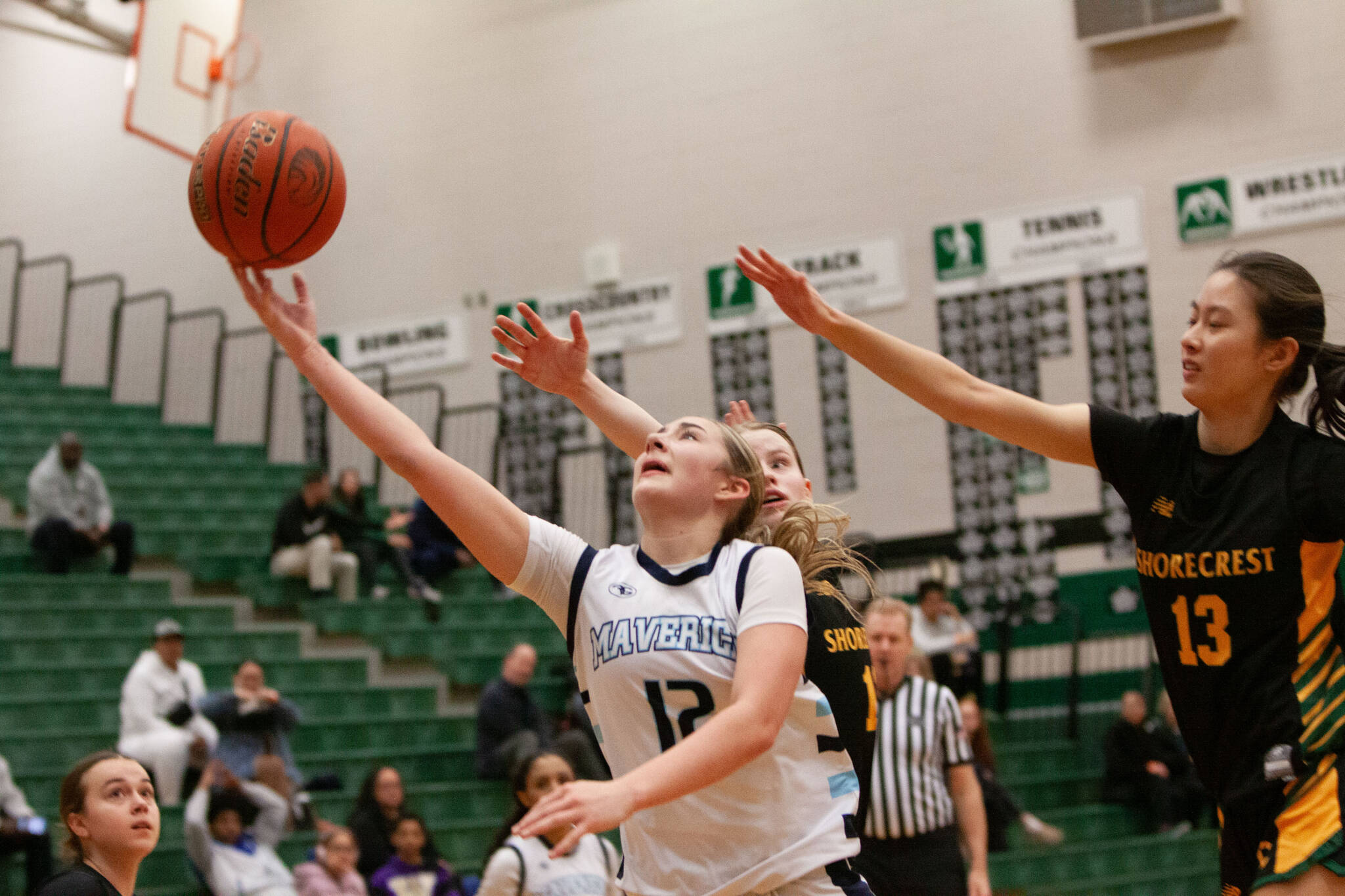 Meadowdales Lexi Zardis goes for a layup against Shorecrest during a district basketball game on Saturday, Feb. 21, 2026 at Jackson H.S. in Mill Creek. (Qasim Ali / The Herald)