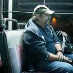 Gene Martin rides the bus before sunrise to an Alcoholics Anonymous meeting in Everett. (Ian Terry / The Herald)