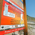 Signs warning of extreme heat, on a trailhead Wednesday at Piestewa Peak in Phoenix.