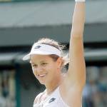Jana Cepelova of Slovakia celebrates after beating Garbine Muguruza of Spain in their women&rsquo;s singles match on day four of the Wimbledon Tennis Championships in London on Thursday. (AP Photo / Ben Curtis)