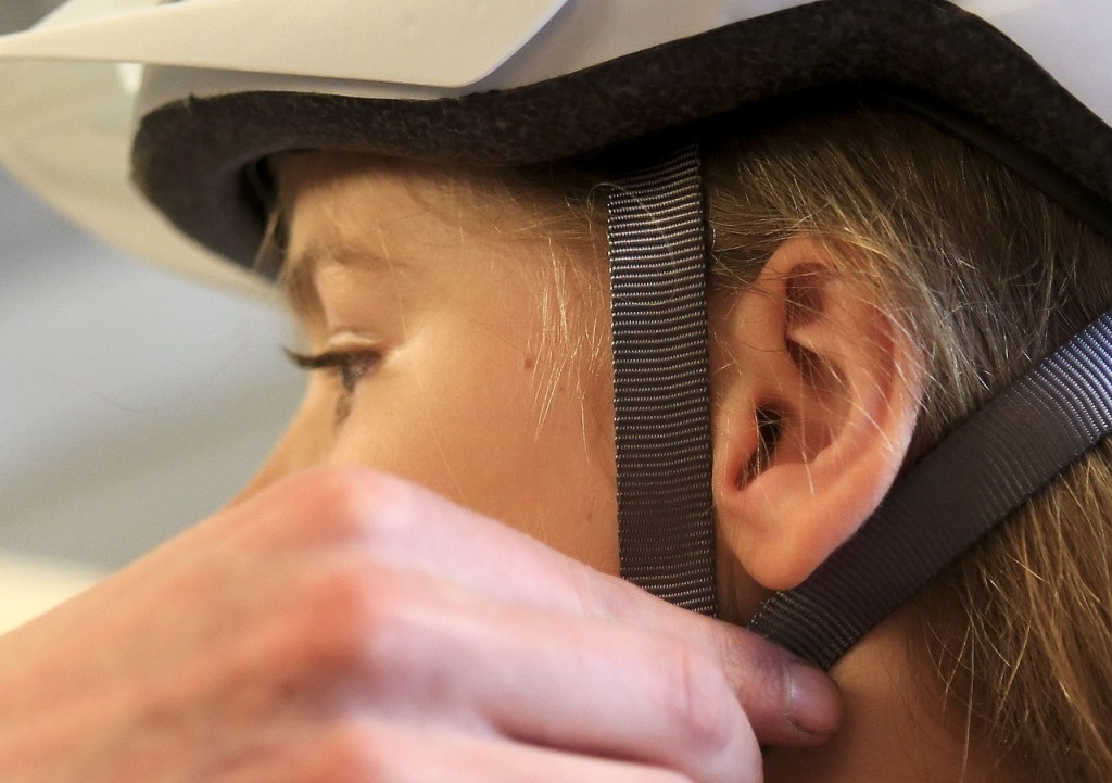 The straps should form a &ldquo;v&rdquo; just below the ear, as shown on the reporter&rsquo;s daughter, Cadence. (Kevin Clark / The Herald)
