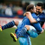 Sounders forward Herculez Gomez (right) leaps into the arms of teammate Erik Friberg after scoring on a penalty kick during aninternational friendly against West Ham United on Tuesday at CenturyLink Field in Seattle. The Sounders won 3-0. (Ian Terry / The Herald)