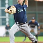 Mariners starting pitcher Wade LeBlanc throws against the Astros in the first inning of a game Wednesday in Houston. LeBlanc gave up five runs, four earned, in Seattle&rsquo;s 9-8 loss.                                George Bridges / Associated Press