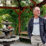 Brian Bansenauer talks about the 30-year efforts of Songaia residents to create a quality environment, and the efforts by developers to remove all trees and build right up to the property boundaries without adequate regard for Songaia&rsquo;s long established way of life. (Dan Bates/The Herald)