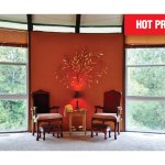 Round home with lake, mountain views