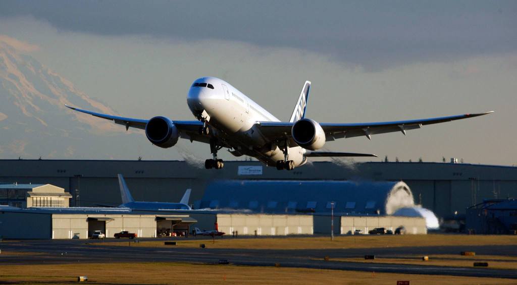 The first 787 destined for a customer lifts off at Paine Field in Everett for its first flight on Jan. 19, 2011. (Michael O&rsquo;Leary / The Herald)