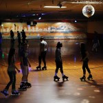 Skaters roll across the floor during a public session at Lynnwood Bowl and Skate on Thursday. The roller skating rink located on Highway 99 in Lynnwood will celebrate its 60th anniversary July 16. (Ian Terry / The Herald)