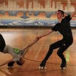 Keaton Mitchell (right), 15, spins around with his skating partner Esha Harwalkar, 15, during a practice session at Lynnwood Bowl and Skate on Thursday. The pair competes in the junior world class and hopes to qualify for the world championships held in Italy later this year. (Ian Terry / The Herald)
