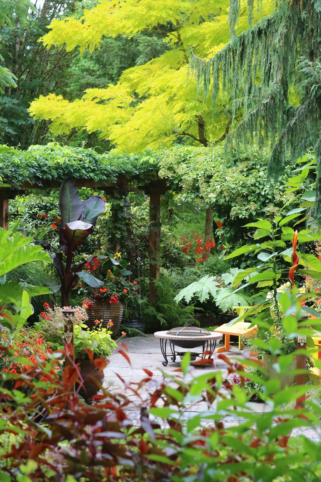 The Petroviches have been working on their garden for 19 years. (Kevin Clark / The Herald)