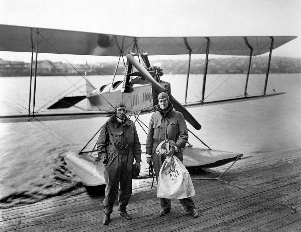 On March 3, 1919, William Boeing (right) and pilot Eddie Hubbard performed the first U.S. international airmail flight in this Boeing Model C, a modified World War I trainer they flew from Vancouver, Canada, to Seattle. (Boeing Co.)