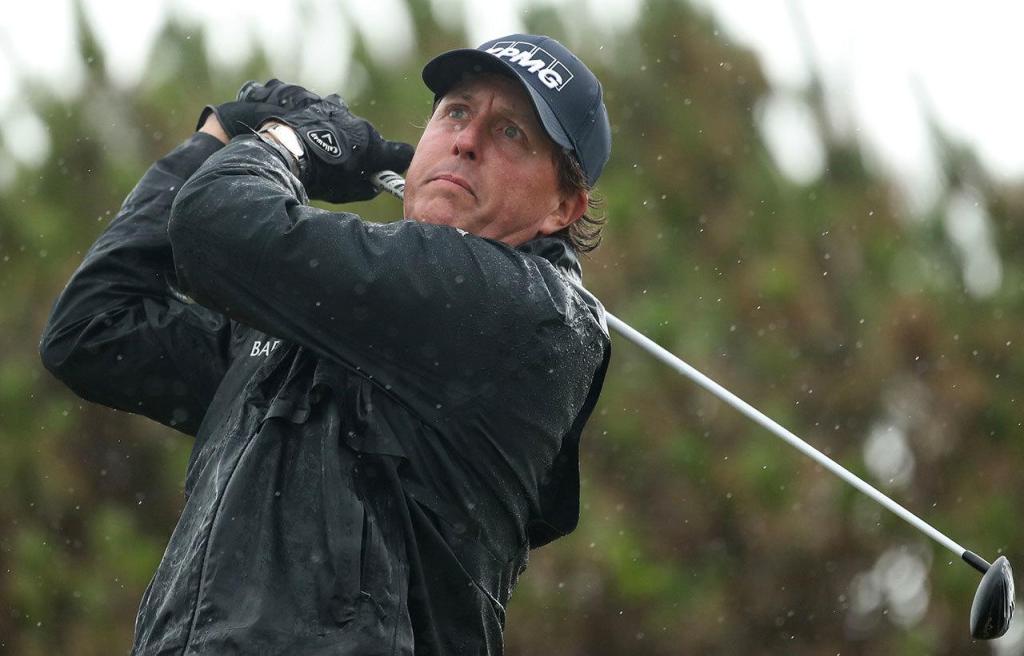 Phil Mickelson hits a tee shot on the 13th hole during the second round of the British Open on Friday at the Royal Troon Golf Club in Troon, Scotland. (AP Photo/Peter Morrison)
