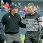 Phil Mickelson of the United States (left) congratulates Henrik Stenson of Sweden on Sunday after Stenson won the British Open Golf Championships at the Royal Troon Golf Club in Troon, Scotland. (AP Photo/Matt Dunham)