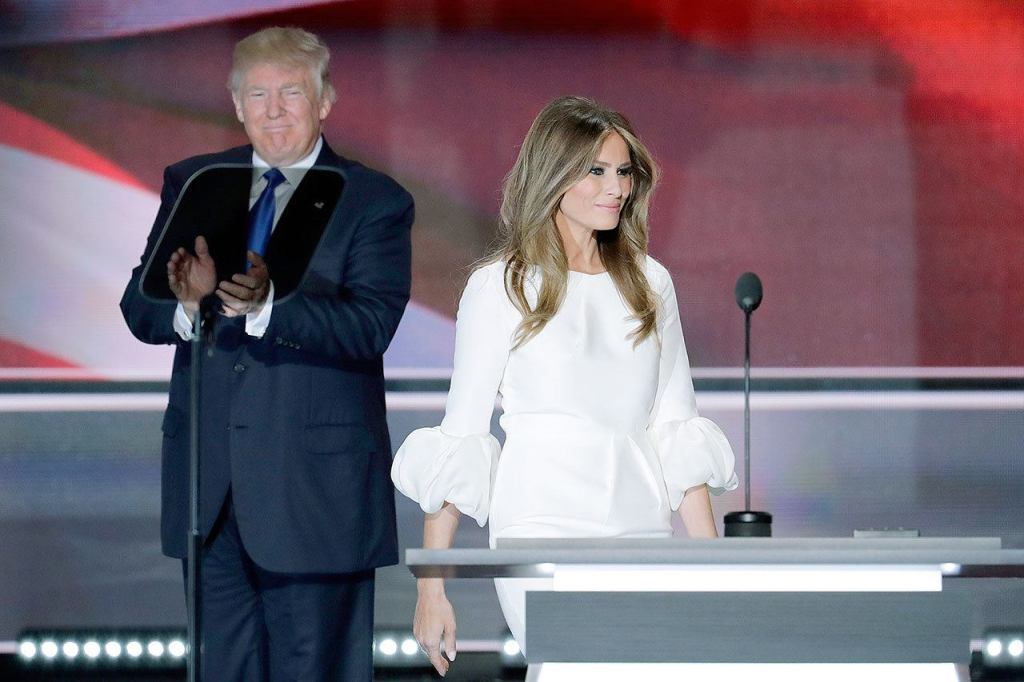 Melania Trump, wife of Republican Presidential Candidate Donald Trump walks to the stage as Donald Trump applaudss during the opening day of the Republican National Convention in Cleveland on Monday. (AP Photo/J. Scott Applewhite)